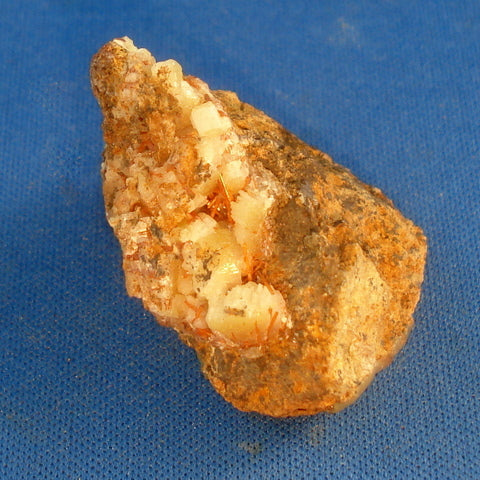 CROCOITE on CERUSSITE. Dundas Extended Mine, Dundas, Tasmania. 20x24x30mm (M900)